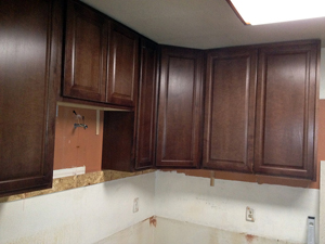 Upper cabinets are installed.